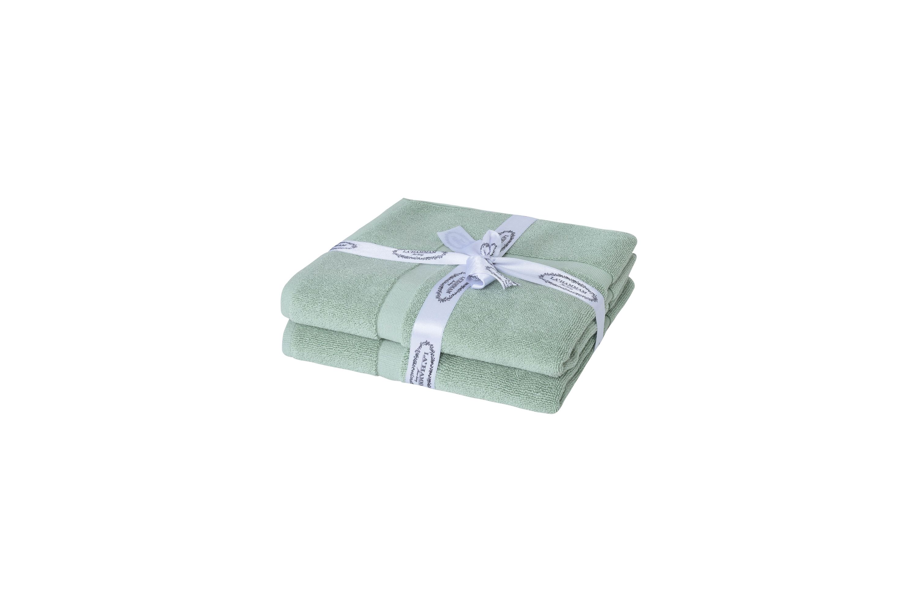 Two luxurious Turkish cotton bath mats in a stylish design, showcasing their plush texture and dobby weave border.