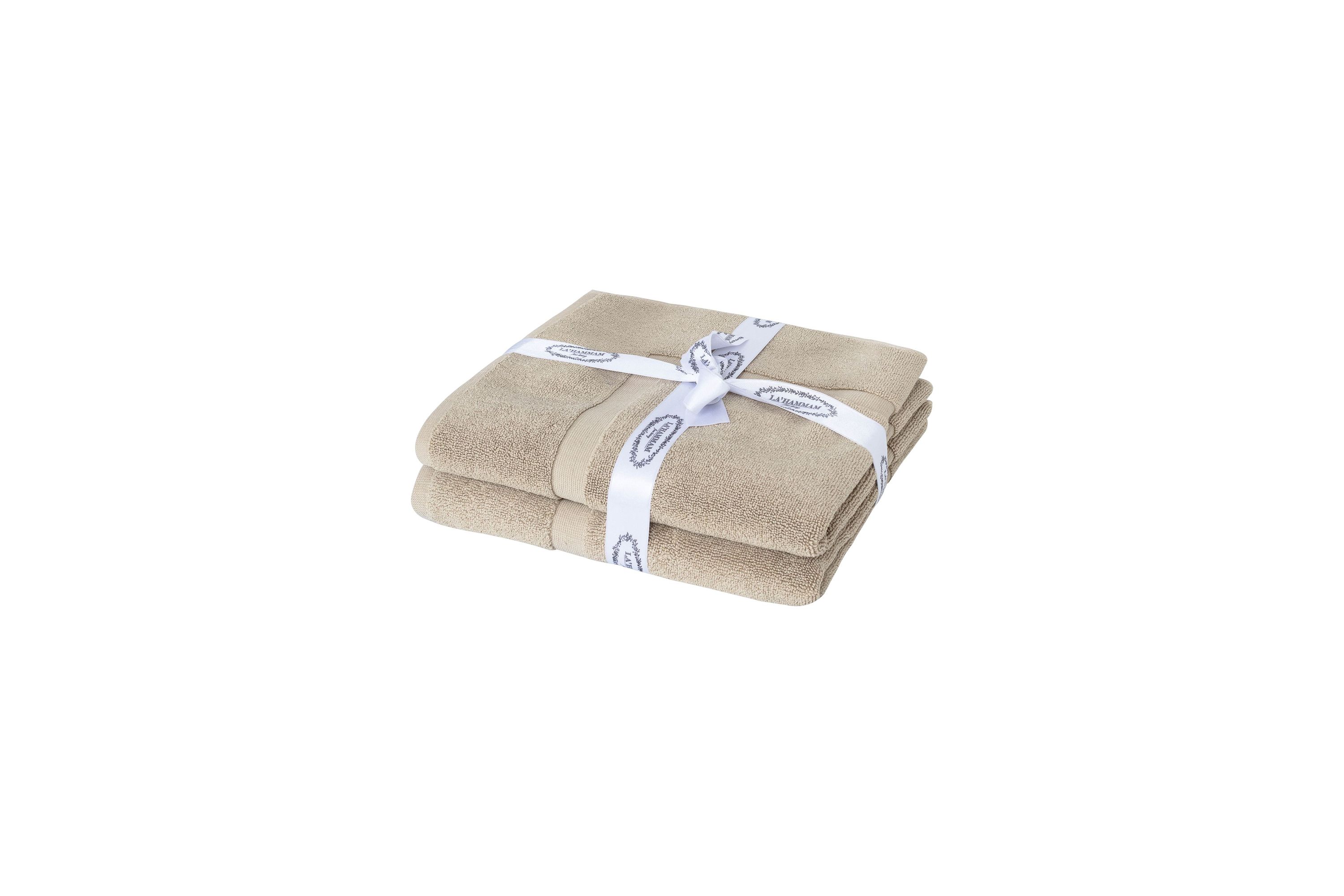 Two luxurious Turkish cotton bath mats in a stylish design, showcasing their plush texture and dobby weave border.