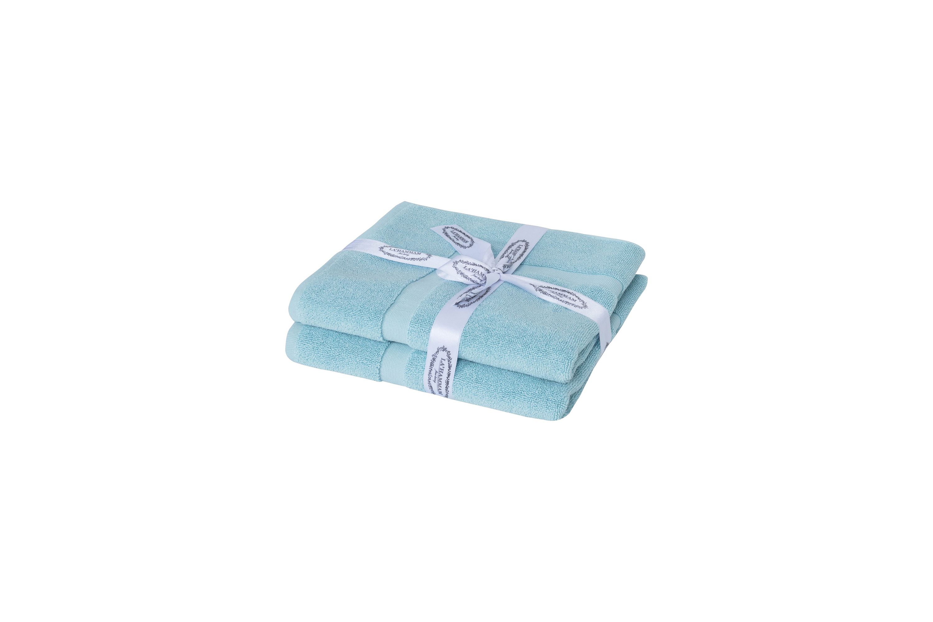 Two luxurious Turkish cotton bath mats in a stylish design, showcasing their plush texture and dobby weave border.