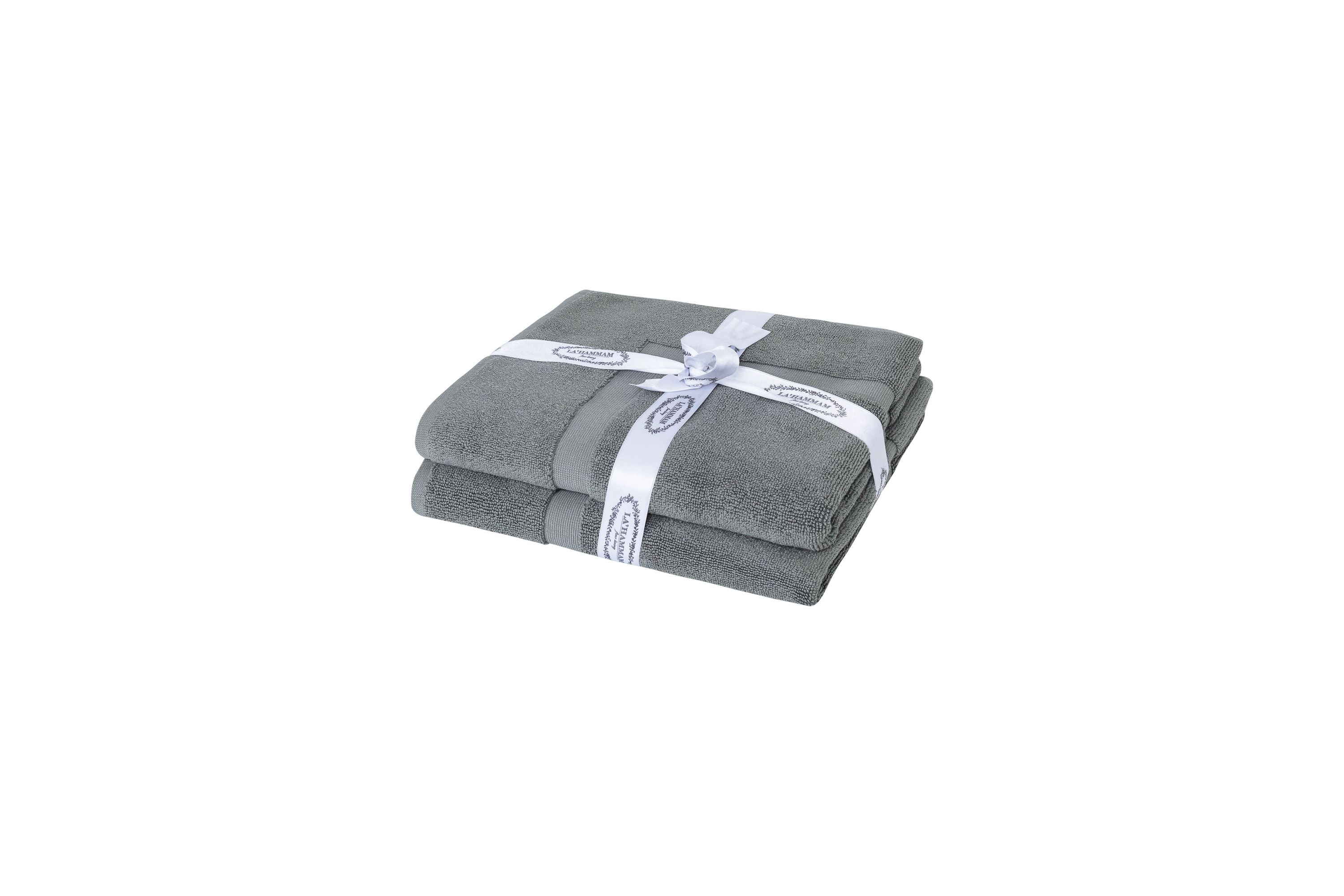 Two luxurious Turkish cotton bath mats in a stylish design, showcasing their plush texture and dobby weave border.