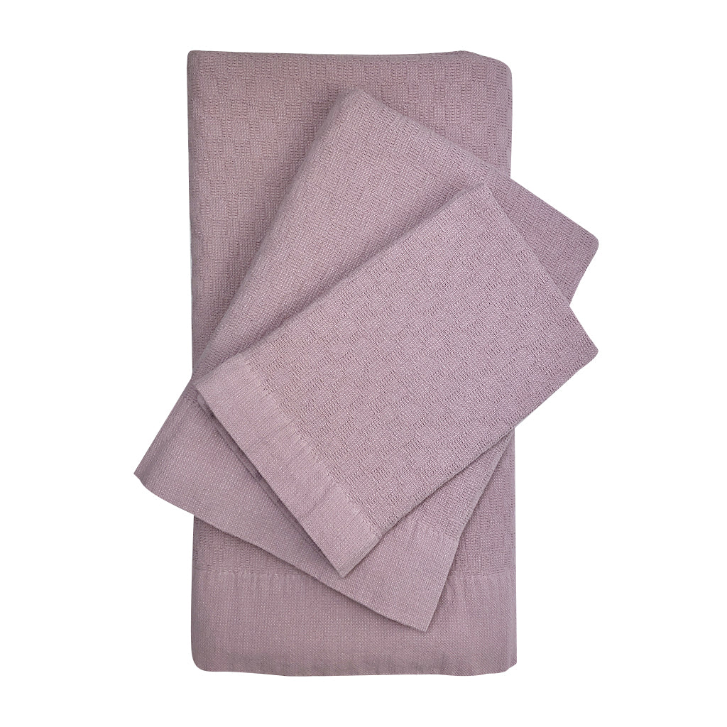 A beautifully crafted Turkish towel bundle set of 3 featuring a honeycomb pattern and terry texture, showcasing the craftsmanship of Turkish artisans.