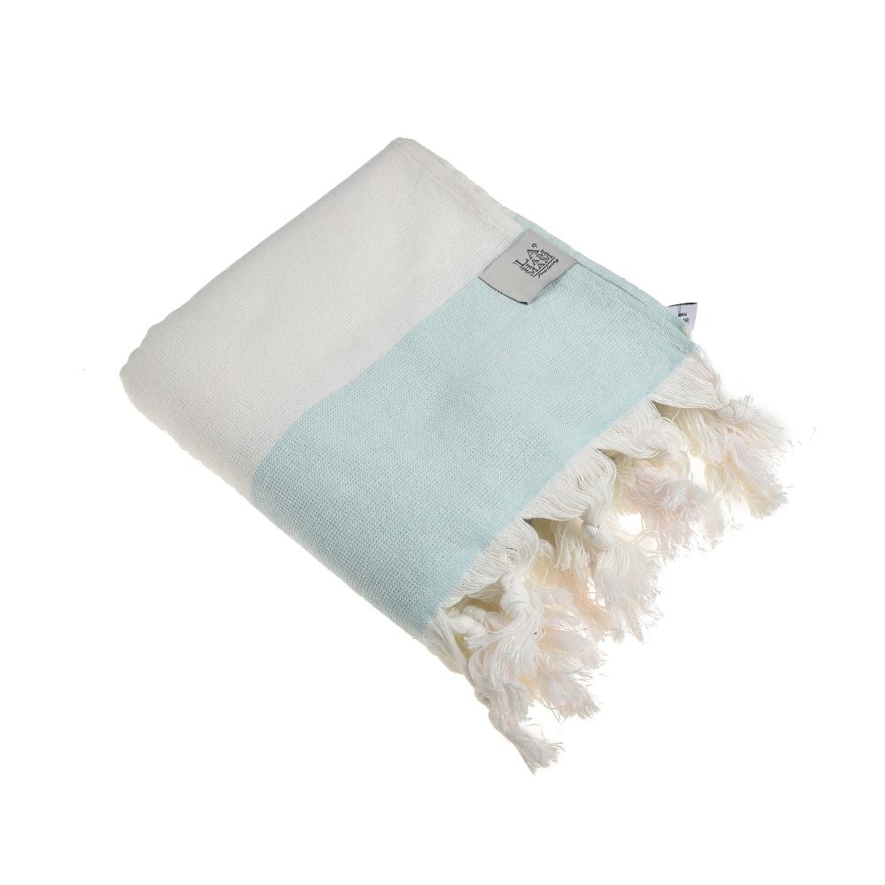 Violet Beach Towel made of soft Turkish cotton with white fringes, perfect for beach or home use.