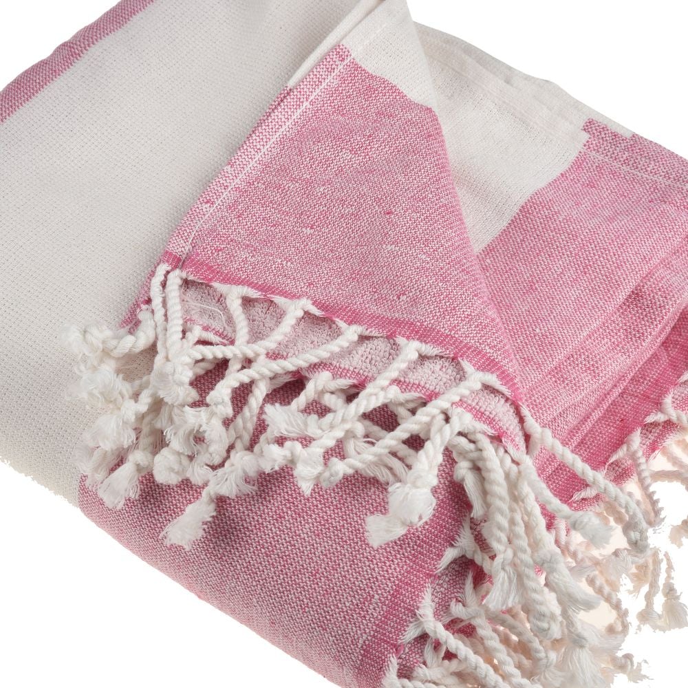 Violet Beach Towel made of soft Turkish cotton with white fringes, perfect for beach or home use.