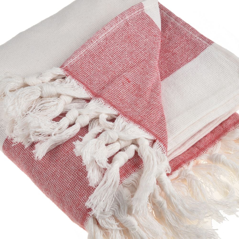 Violet Beach Towel made of soft Turkish cotton with white fringes, perfect for beach or home use.