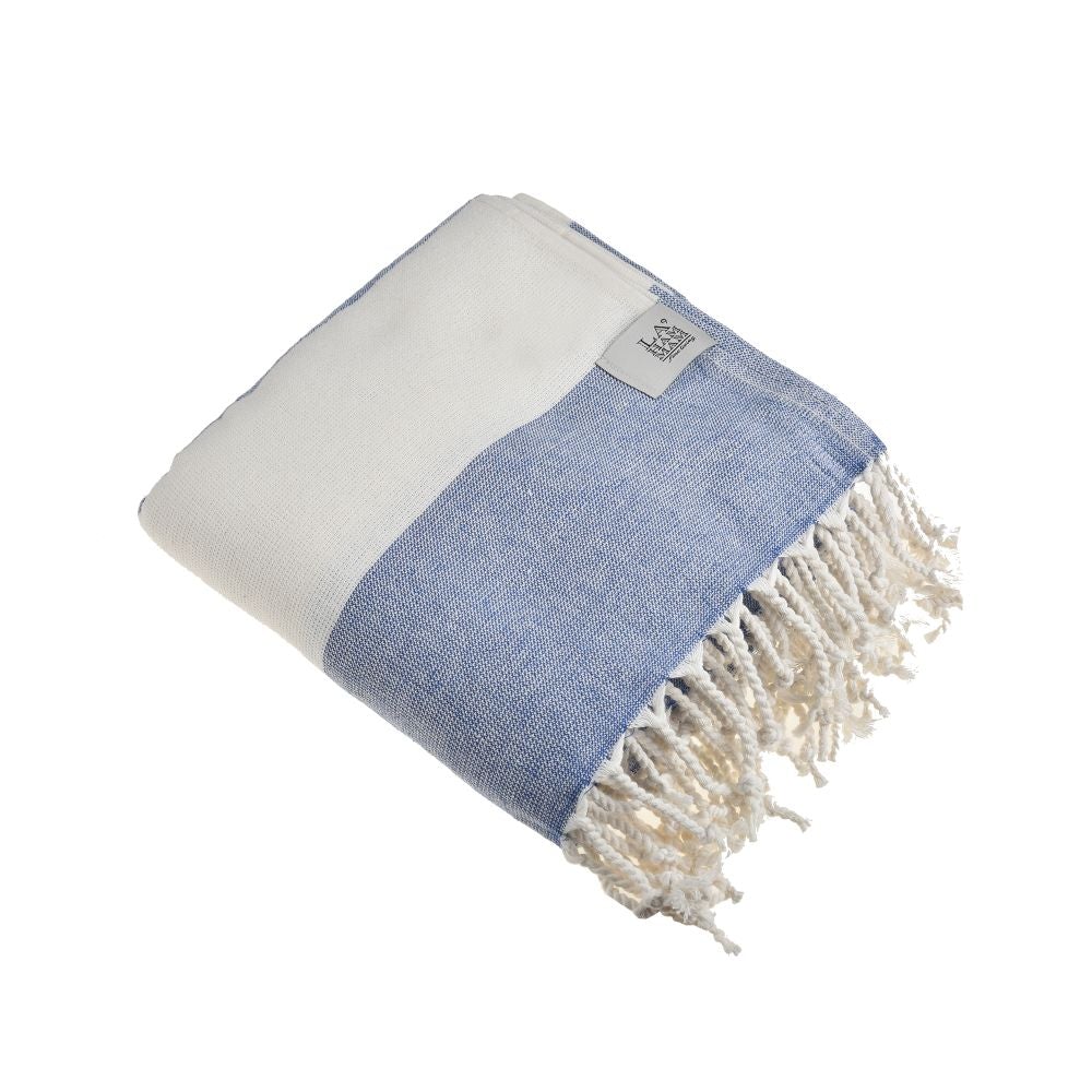 Violet Beach Towel made of soft Turkish cotton with white fringes, perfect for beach or home use.