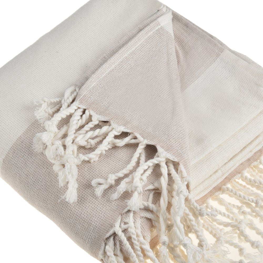 Violet Beach Towel made of soft Turkish cotton with white fringes, perfect for beach or home use.