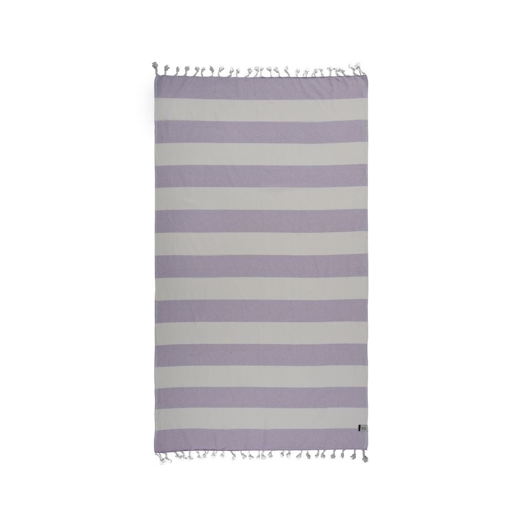 Violet Beach Towel made of soft Turkish cotton with white fringes, perfect for beach or home use.