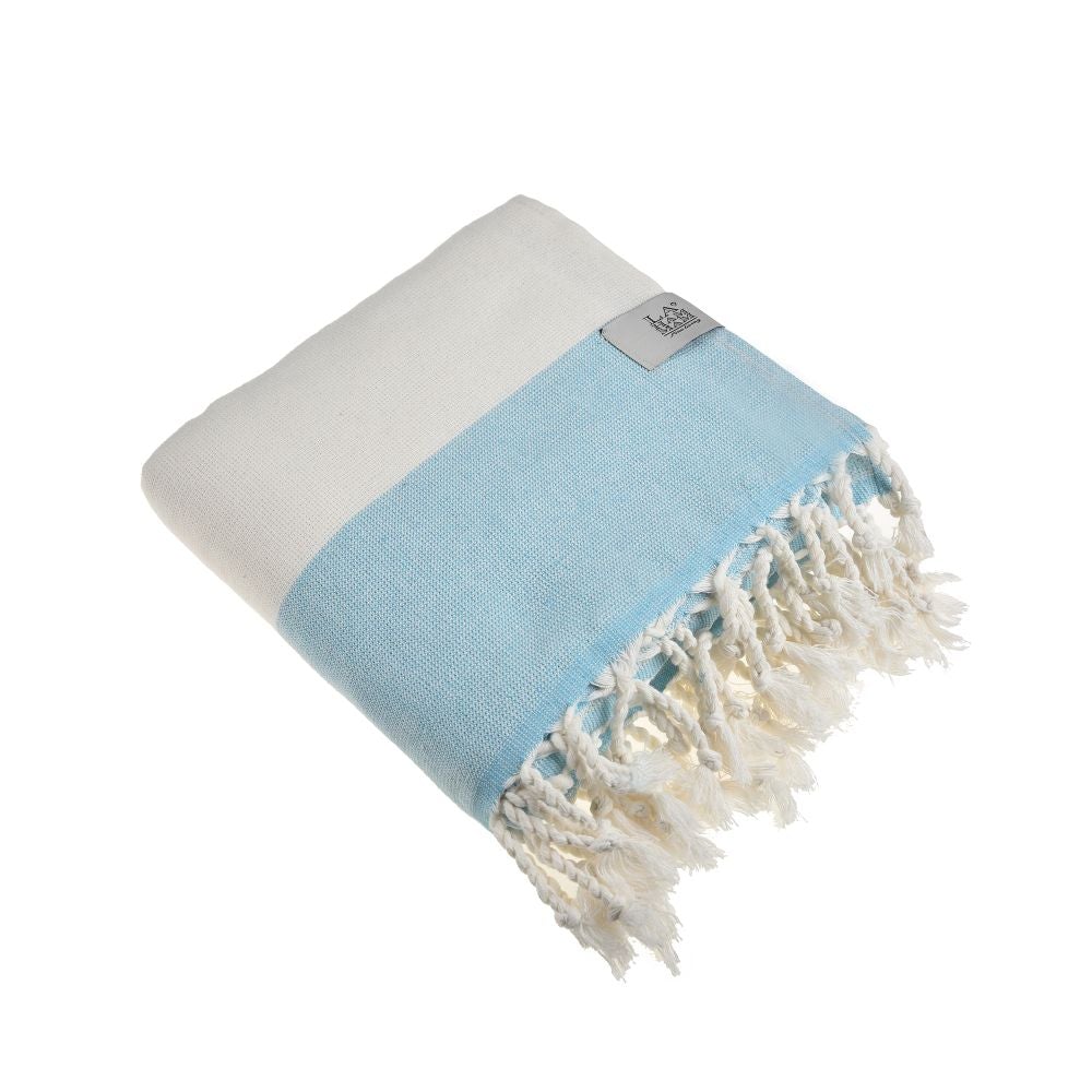 Violet Beach Towel made of soft Turkish cotton with white fringes, perfect for beach or home use.