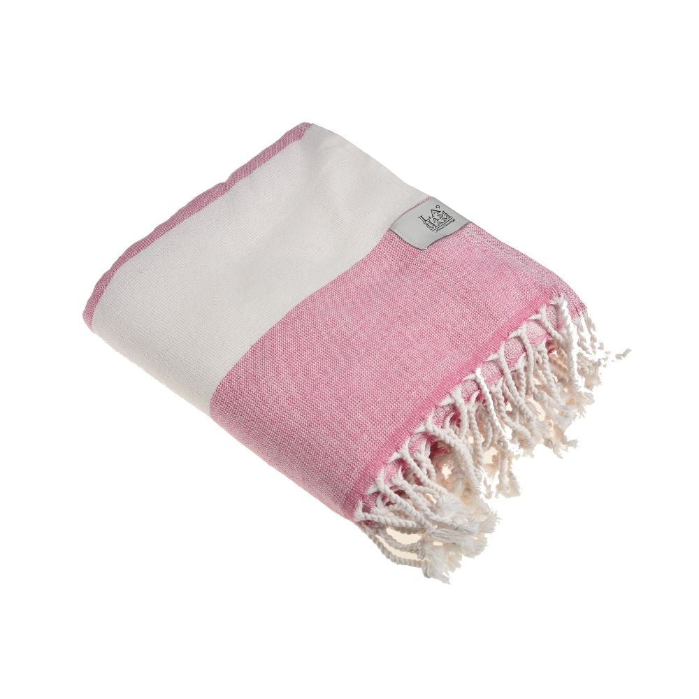 Violet Beach Towel made of soft Turkish cotton with white fringes, perfect for beach or home use.