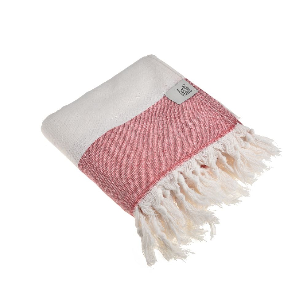 Violet Beach Towel made of soft Turkish cotton with white fringes, perfect for beach or home use.