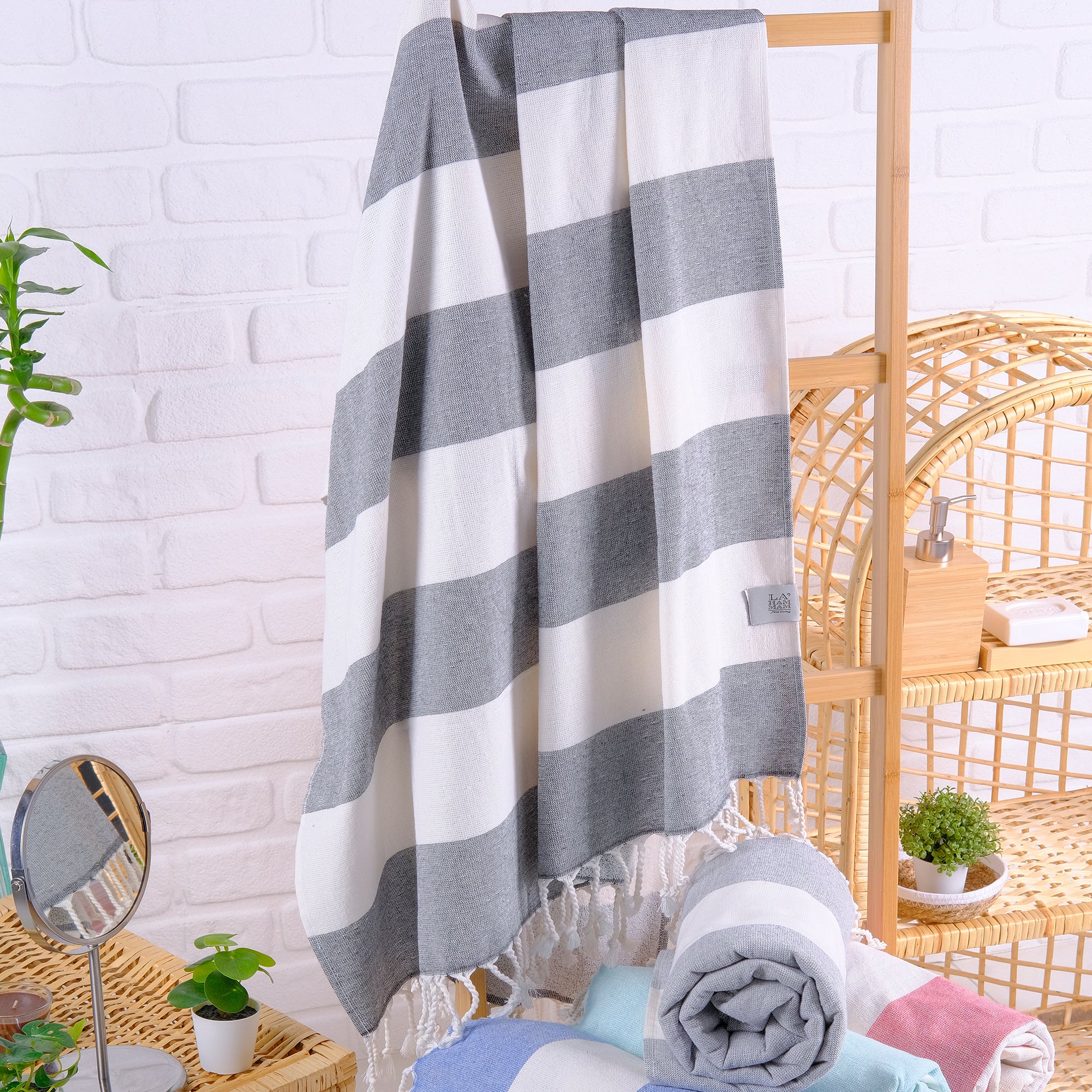 Violet Beach Towel made of soft Turkish cotton with white fringes, perfect for beach or home use.