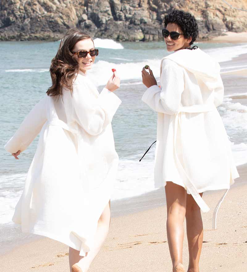 Women's Full Length Lightweight Waffle Spa Robe with Shawl Collar in various colors, showcasing its soft texture and stylish design.