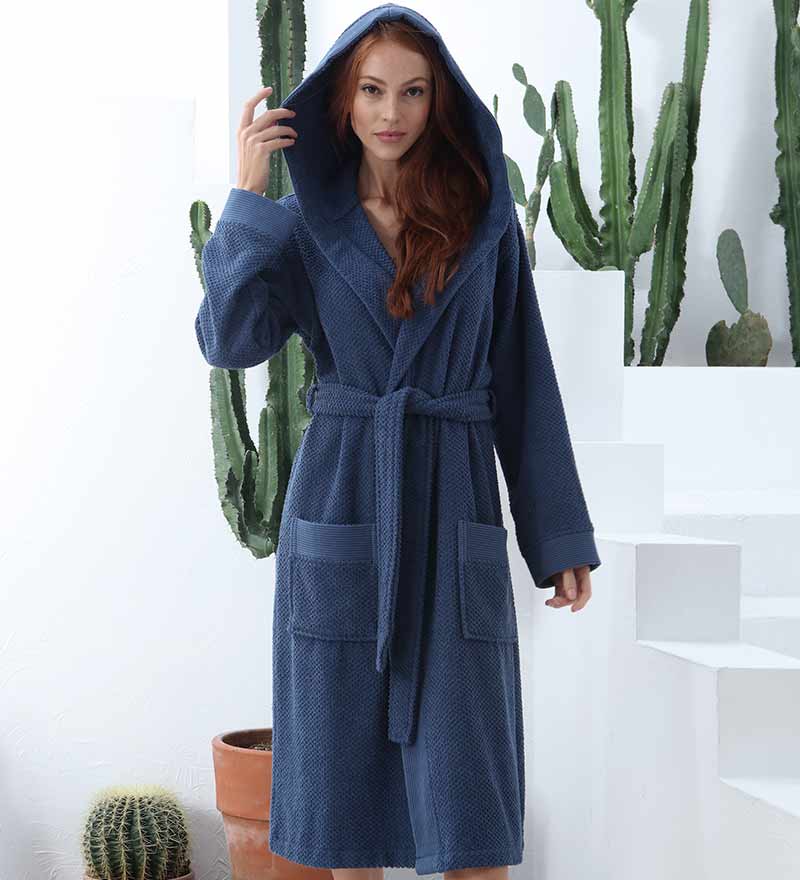 A luxurious Women's Hooded Turkish Cotton Terry Cloth Robe in calming colors, featuring a soft hood, large pockets, and a stylish belt.