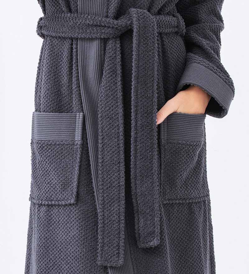 A luxurious Women's Hooded Turkish Cotton Terry Cloth Robe in calming colors, featuring a soft hood, large pockets, and a stylish belt.