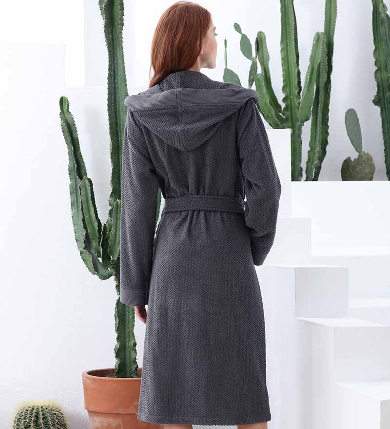 A luxurious Women's Hooded Turkish Cotton Terry Cloth Robe in calming colors, featuring a soft hood, large pockets, and a stylish belt.