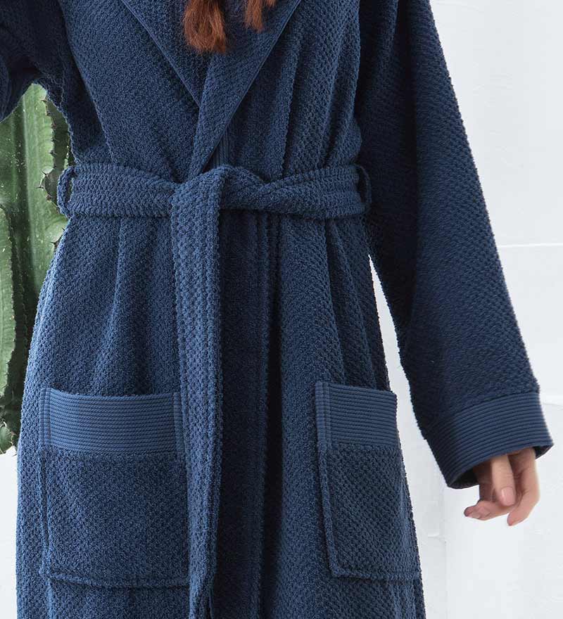 A luxurious Women's Hooded Turkish Cotton Terry Cloth Robe in calming colors, featuring a soft hood, large pockets, and a stylish belt.