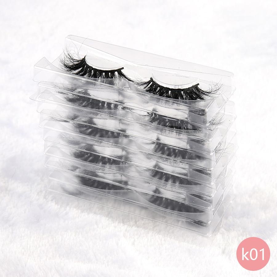 A set of 3D mink eyelashes displayed, showcasing their thick and dramatic style, cruelty-free and hand-made for a luxurious look.