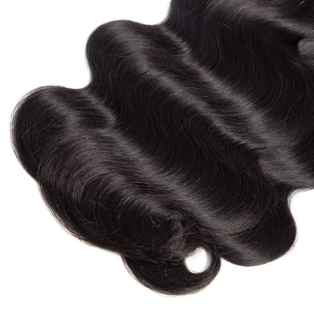 10A Grade Body Wave Peruvian Human Hair Bundles in natural black color, showcasing soft waves and high-quality texture.