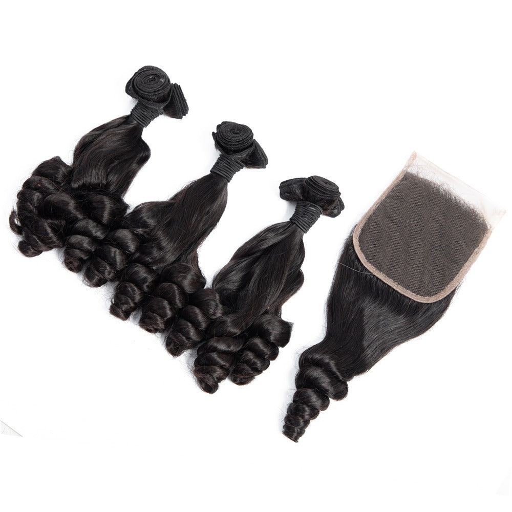 10A Grade Brazilian 3/4 Spiral Curl Human Hair bundles with a 4x4 closure, showcasing bouncy curls and natural color.