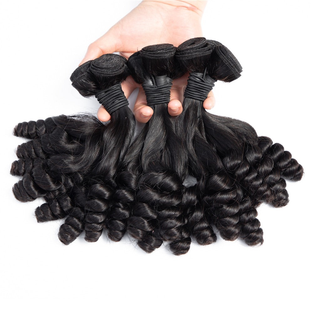 10A Grade Brazilian 3/4 Spiral Curl Human Hair bundles with a 4x4 closure, showcasing bouncy curls and natural color.