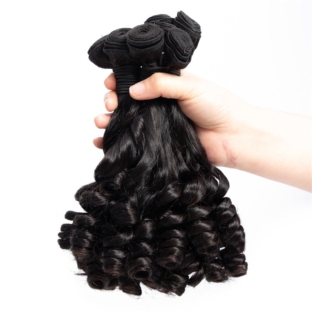 10A Grade Brazilian 3/4 Spiral Curl Human Hair bundles with a 4x4 closure, showcasing bouncy curls and natural color.