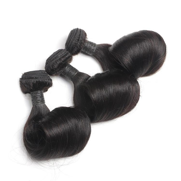 10A Grade Brazilian Egg Curl Fumi Human Hair Bundles with 4x4 closure, showcasing natural curls and high-quality texture.