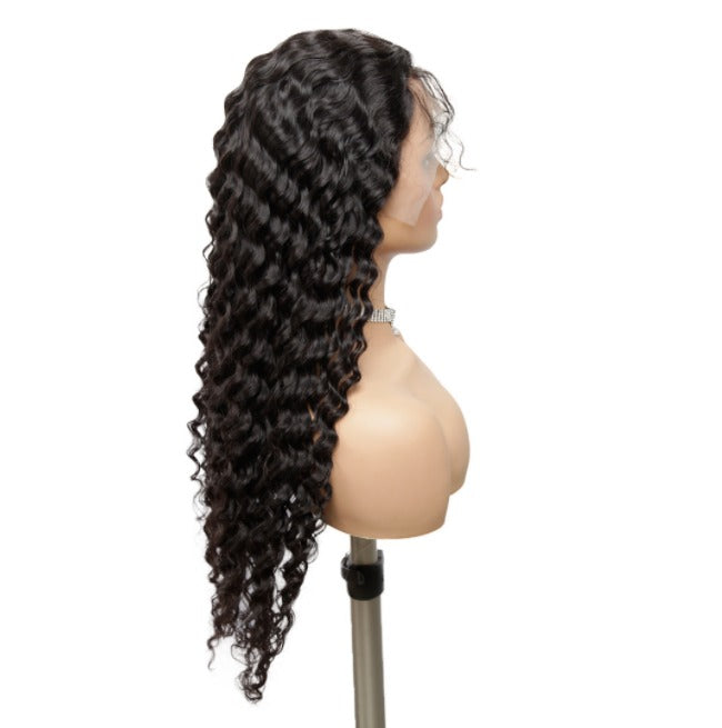 A beautiful 13x1x4 Deep Wave Lace Transparent Human Hair Wig displayed on a mannequin, showcasing its natural waves and transparent lace.