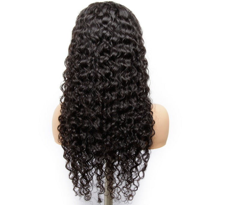 13x1x4 Jerry Curl Lace Wig in natural color, showcasing its soft curls and transparent lace for a realistic look.