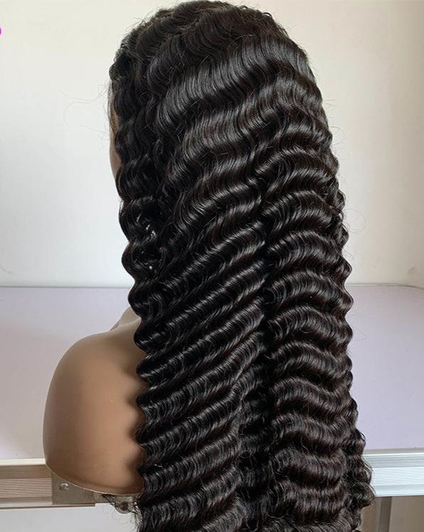 A beautiful 13x1x4 Loose Deep Wave Lace Wig made from 100% human hair, showcasing its natural texture and T part lace design.