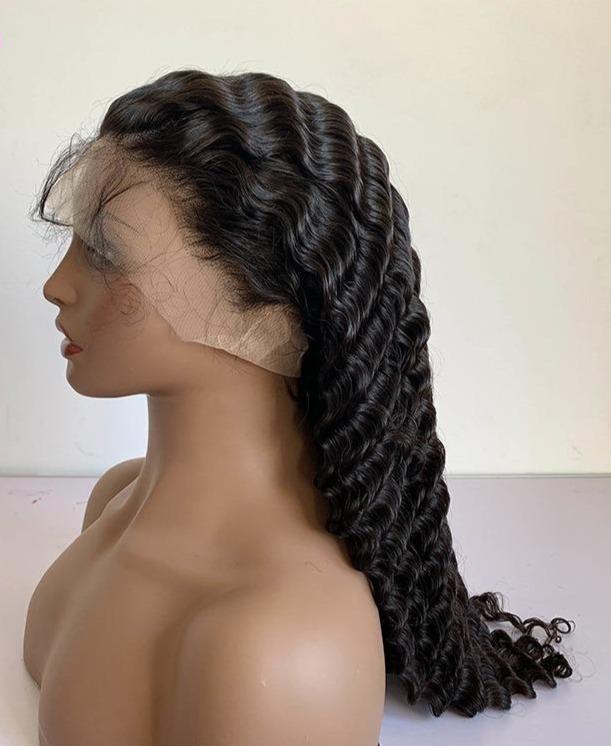 A beautiful 13x1x4 Loose Deep Wave Lace Wig made from 100% human hair, showcasing its natural texture and T part lace design.