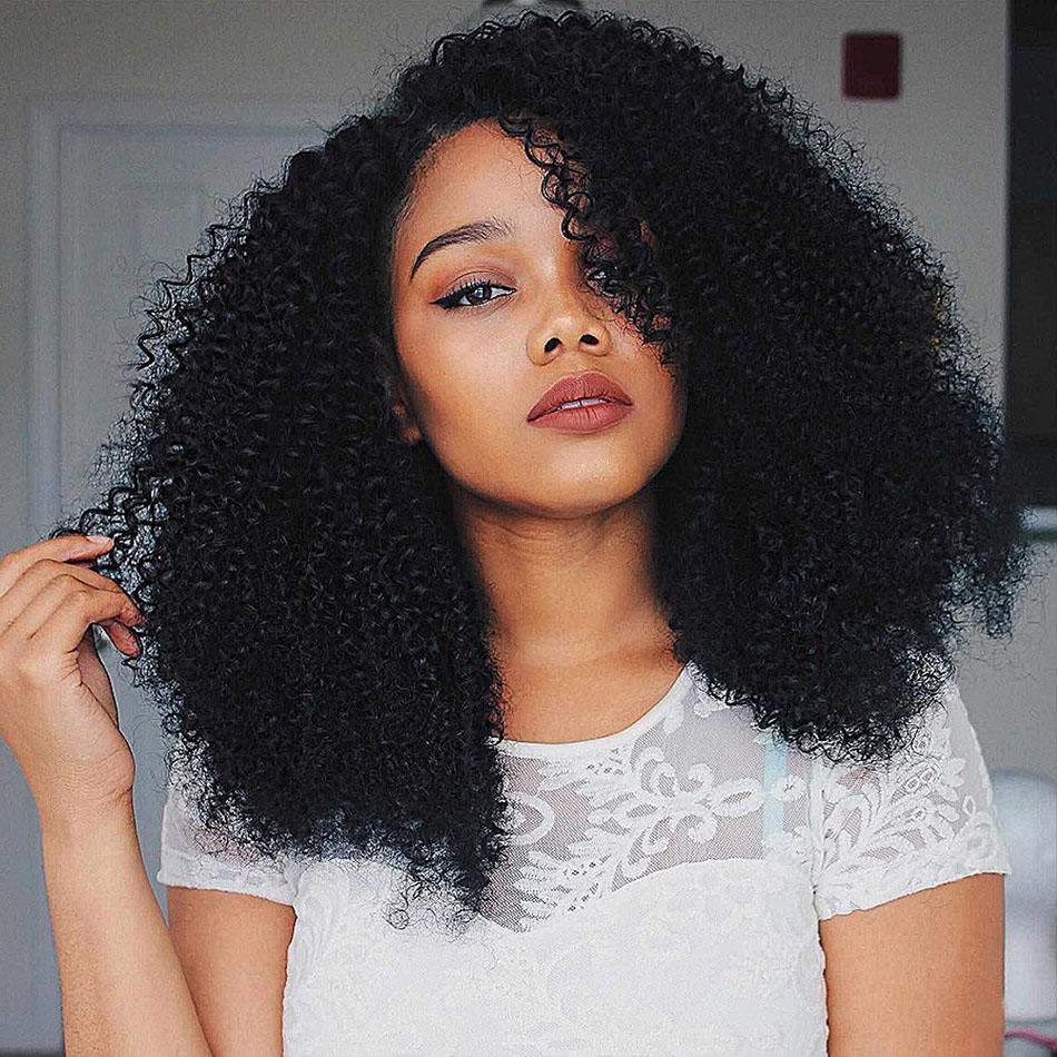 A beautiful 13x4 HD Transparent Lace Frontal Afro Kinky Curly Human Hair Wig displayed on a mannequin, showcasing its natural curls and high-quality lace.