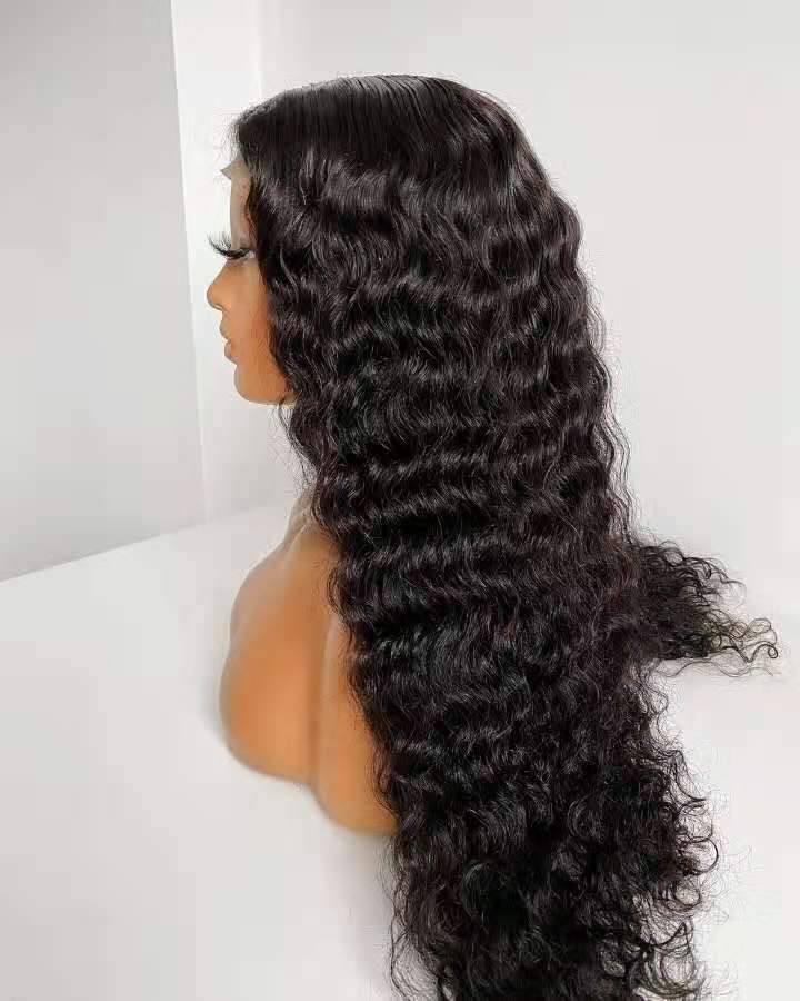 180% Density Full 4x4 Transparent Lace Front Deep Wave Human Hair Wig displayed on a mannequin, showcasing its natural waves and high-quality lace.