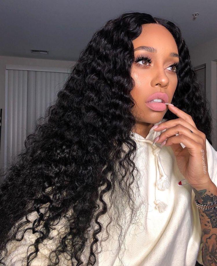 180% Density Full 4x4 Transparent Lace Front Deep Wave Human Hair Wig displayed on a mannequin, showcasing its natural waves and high-quality lace.