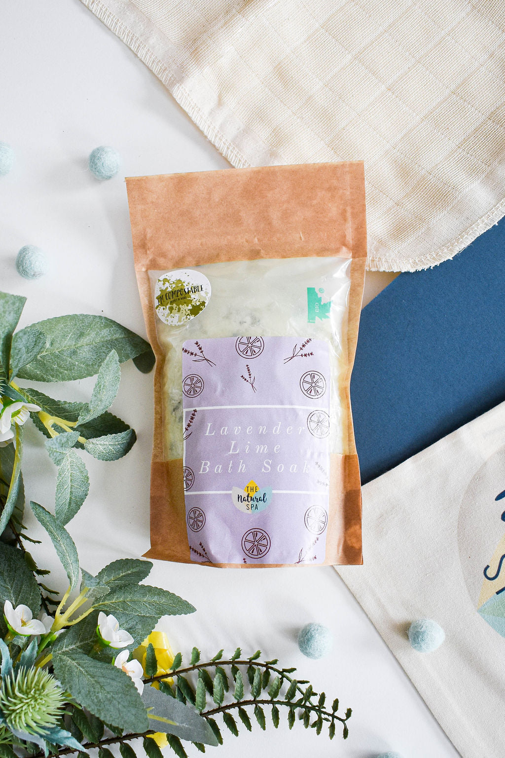 1kg Lavender and Lime Bath Soak in a compostable pouch, showcasing natural bath crystals with lavender and lime ingredients.