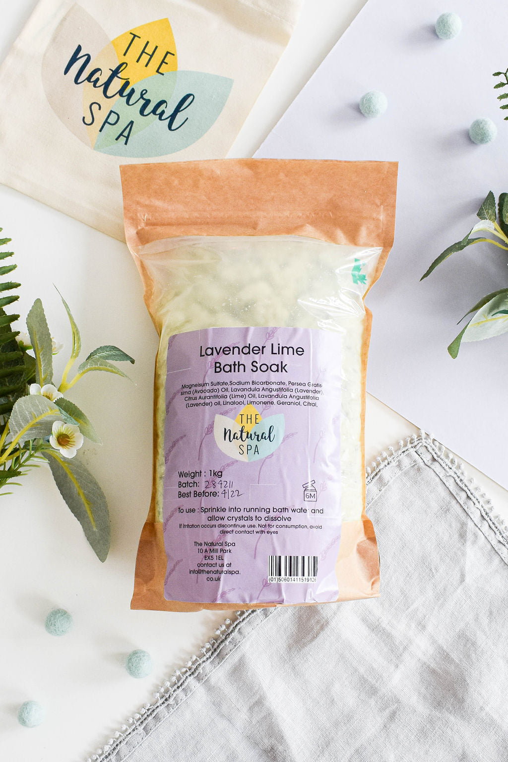 1kg Lavender and Lime Bath Soak in a compostable pouch, showcasing natural bath crystals with lavender and lime ingredients.