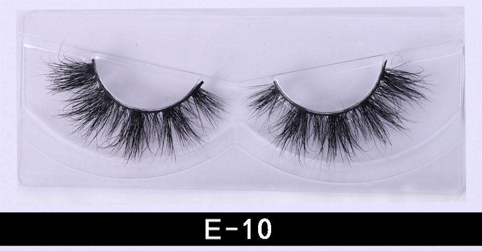 A pair of luxurious 3D mink eyelashes displayed in a glitter box, showcasing their natural wispy and fluffy design.