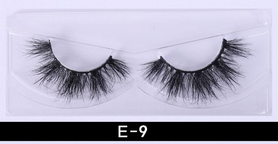 A pair of luxurious 3D mink eyelashes displayed in a glitter box, showcasing their natural wispy and fluffy design.