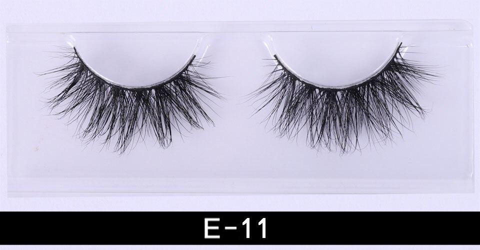 A pair of luxurious 3D mink eyelashes displayed in a glitter box, showcasing their natural wispy and fluffy design.