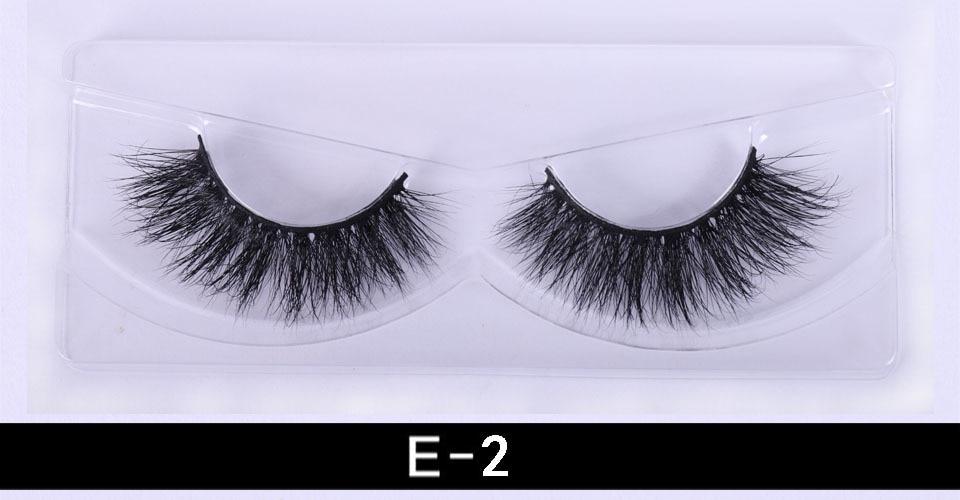 A pair of luxurious 3D mink eyelashes displayed in a glitter box, showcasing their natural wispy and fluffy design.