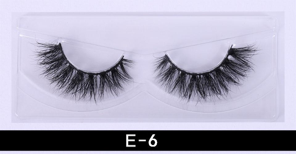 A pair of luxurious 3D mink eyelashes displayed in a glitter box, showcasing their natural wispy and fluffy design.