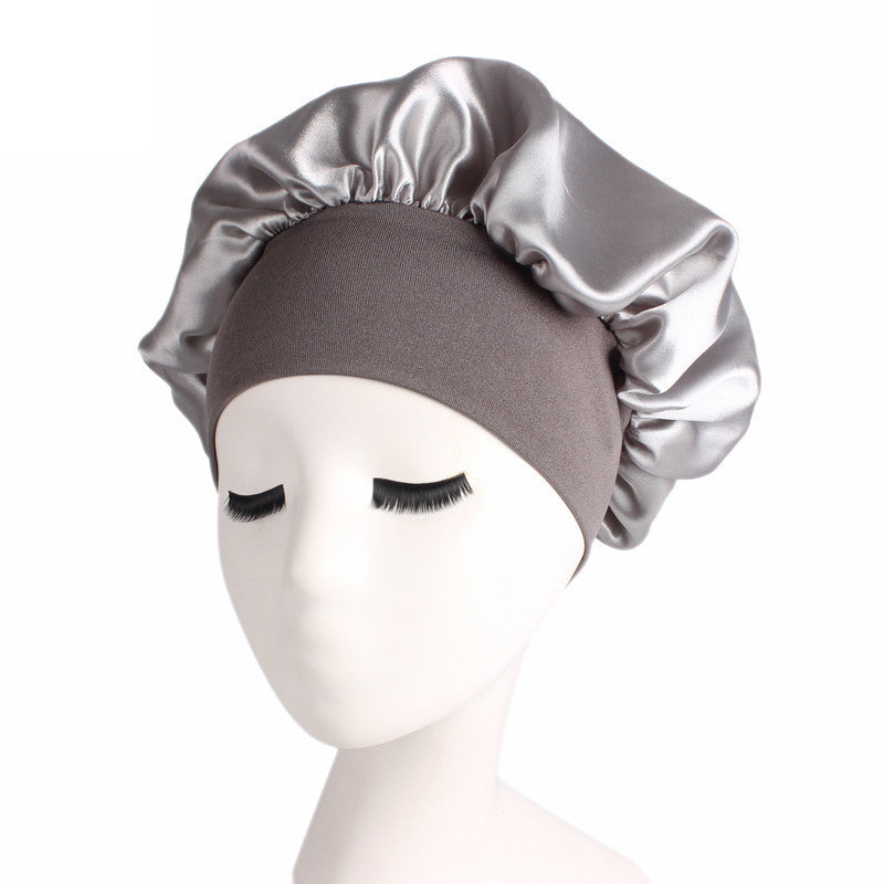 Adjustable solid satin bonnet cap for women, designed for long hair care and styling, available in multiple colors.