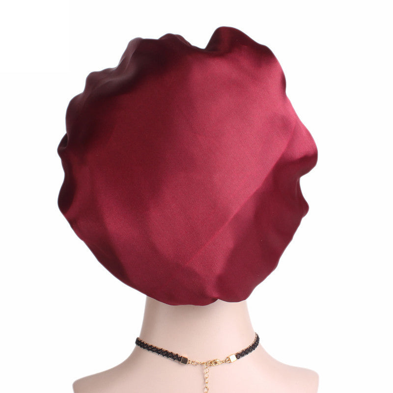 Adjustable solid satin bonnet cap for women, designed for long hair care and styling, available in multiple colors.