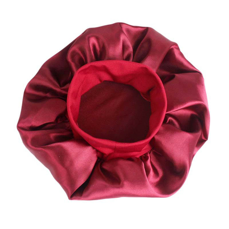 Adjustable solid satin bonnet cap for women, designed for long hair care and styling, available in multiple colors.