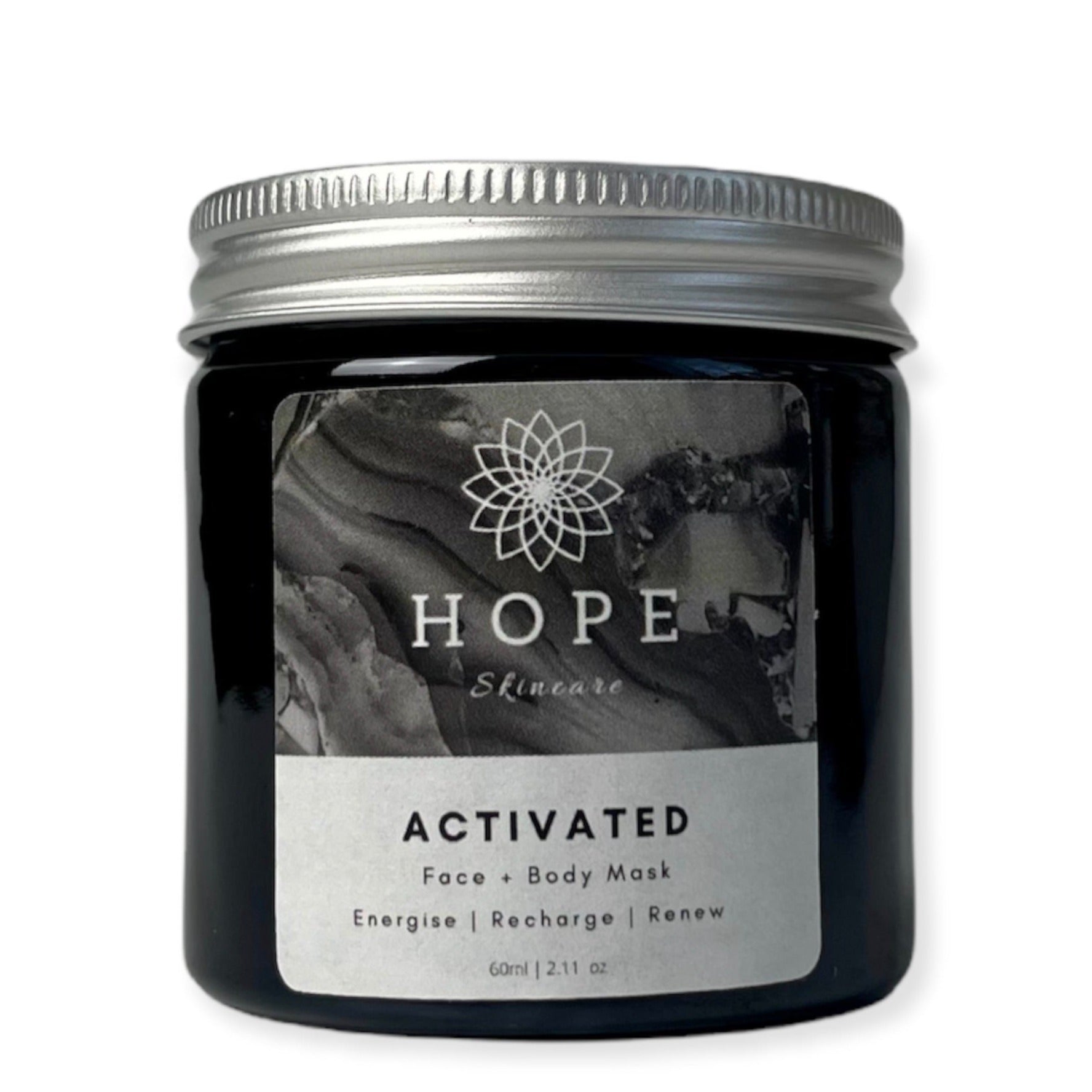 Activated Cleansing Mask featuring activated charcoal and bentonite clay in a sleek jar, designed for deep cleansing and skin rejuvenation.