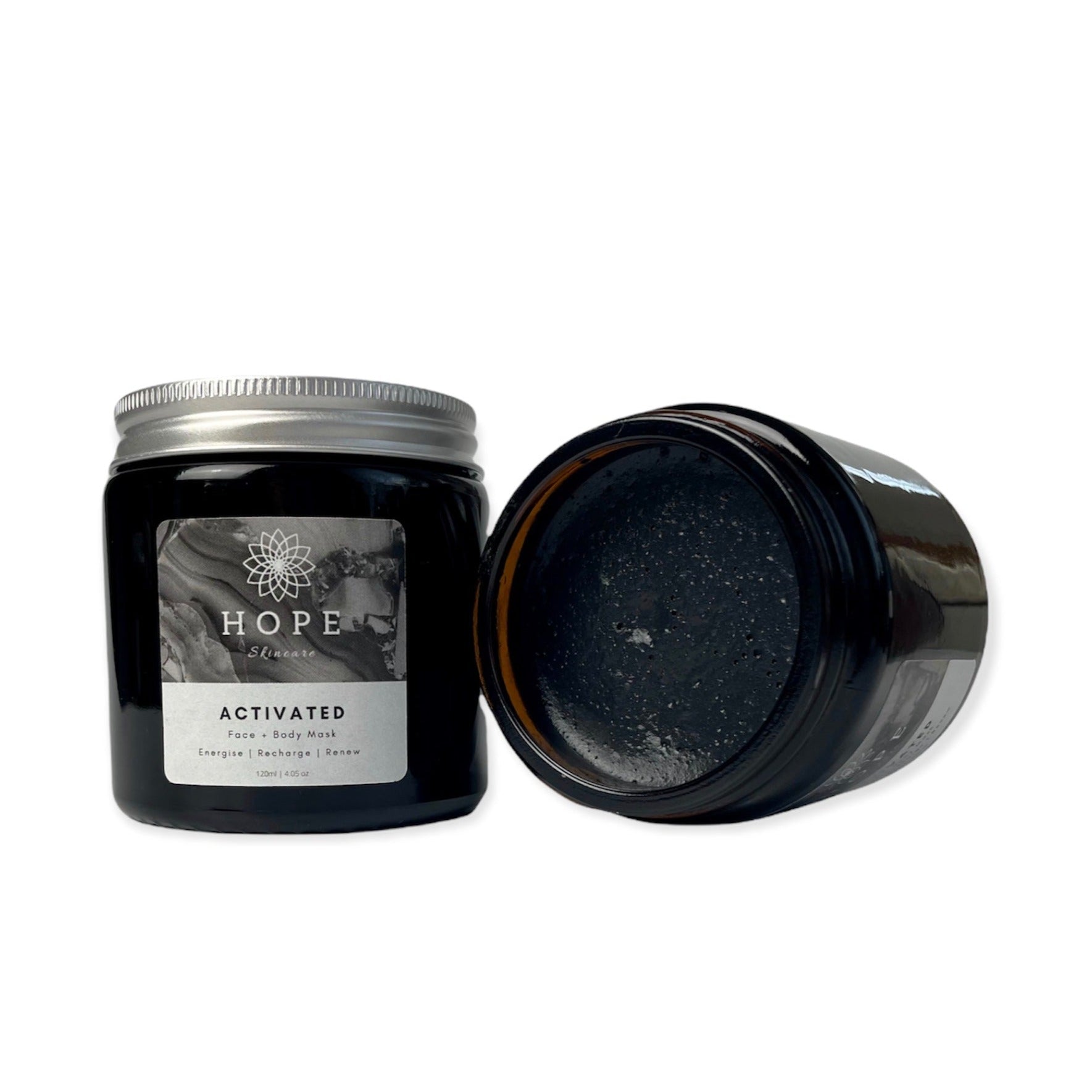 Activated Cleansing Mask featuring activated charcoal and bentonite clay in a sleek jar, designed for deep cleansing and skin rejuvenation.