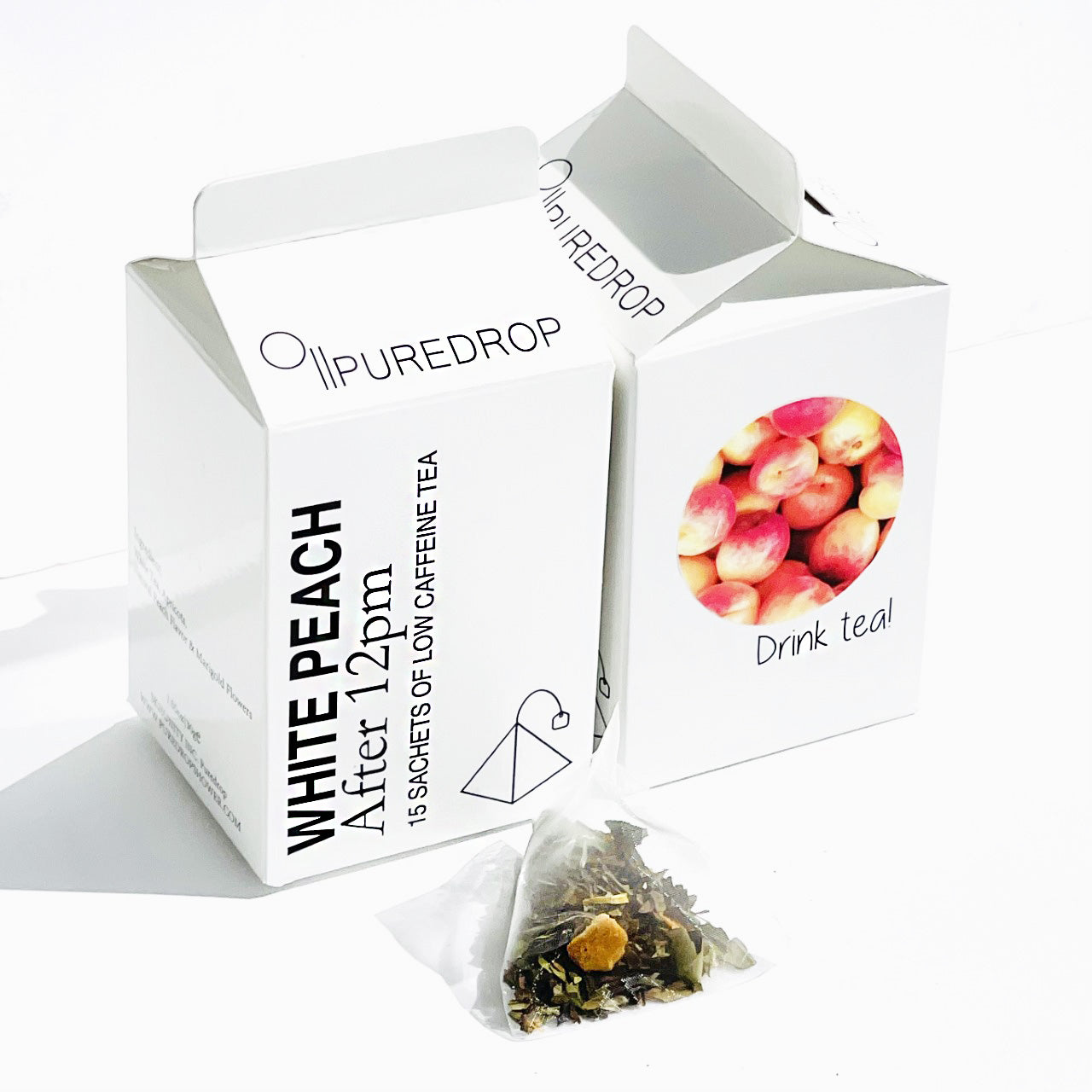 A box of After 12pm White Peach Tea sachets featuring elegant packaging with peach and floral designs.