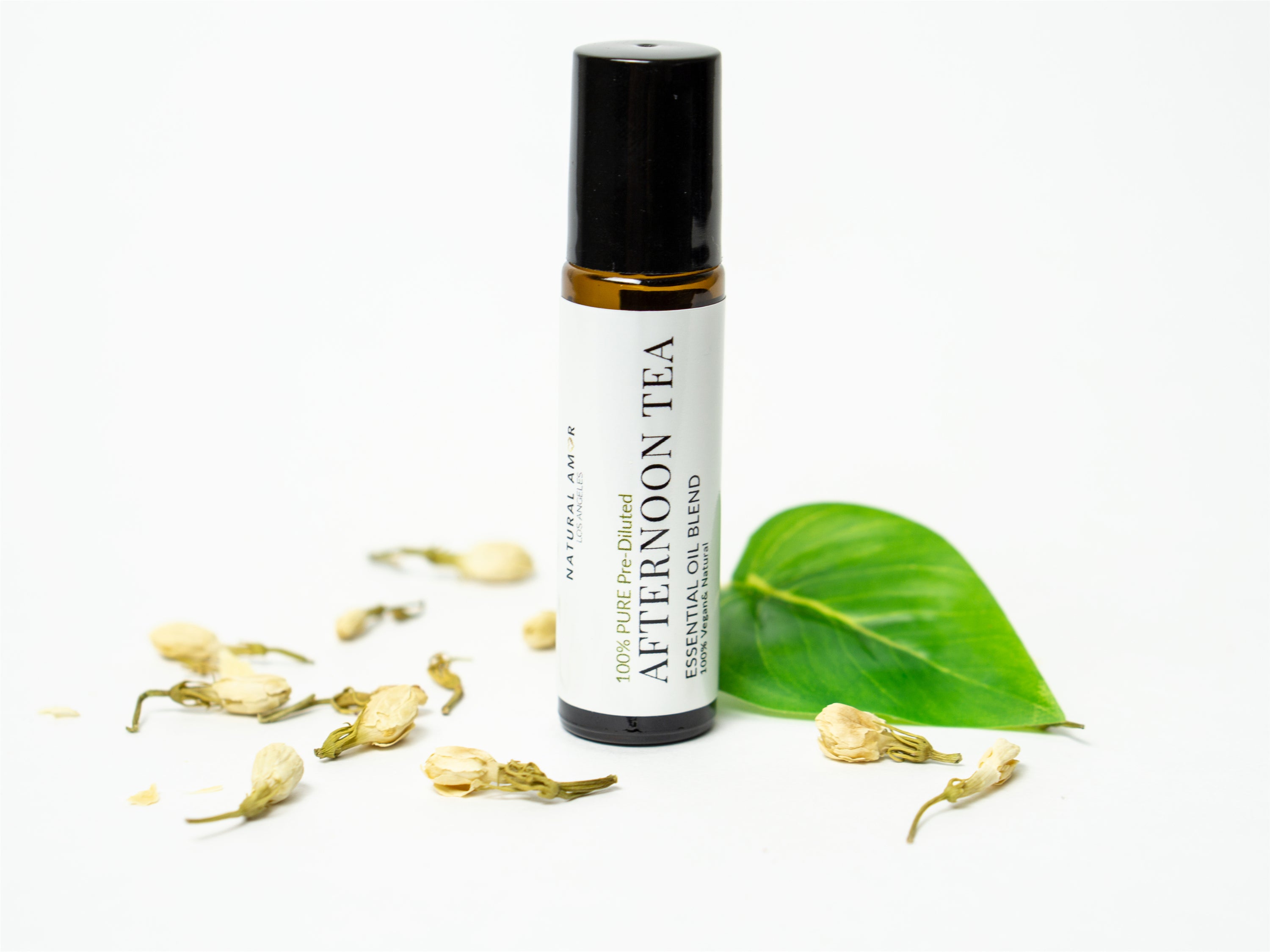 Afternoon Tea Roll On Essential Oil Blend in a 10 mL bottle with a stainless steel rollerball, showcasing its calming and balancing properties.