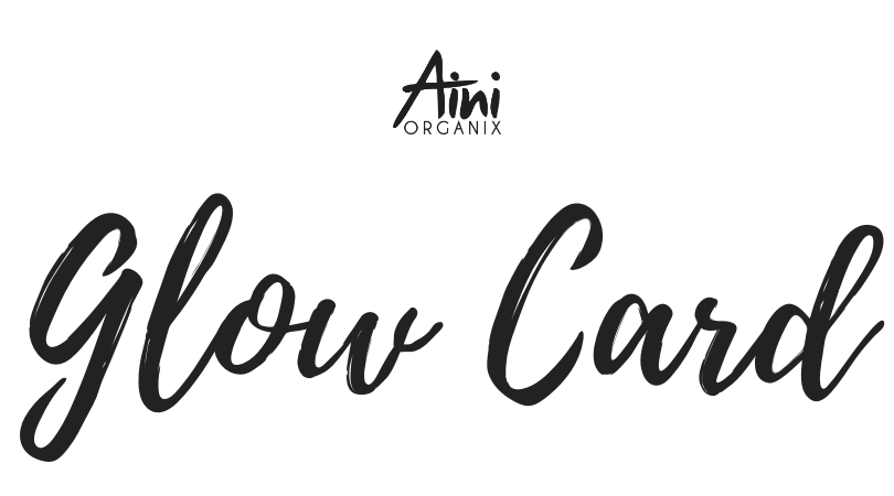 Aini Organix Glow Card displayed on a stylish background, showcasing its elegant design and branding.