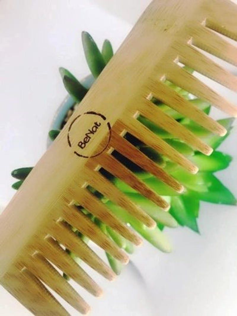 All-Natural Bamboo Hair Comb, eco-friendly grooming tool for men and women, promoting healthy hair growth and scalp care.