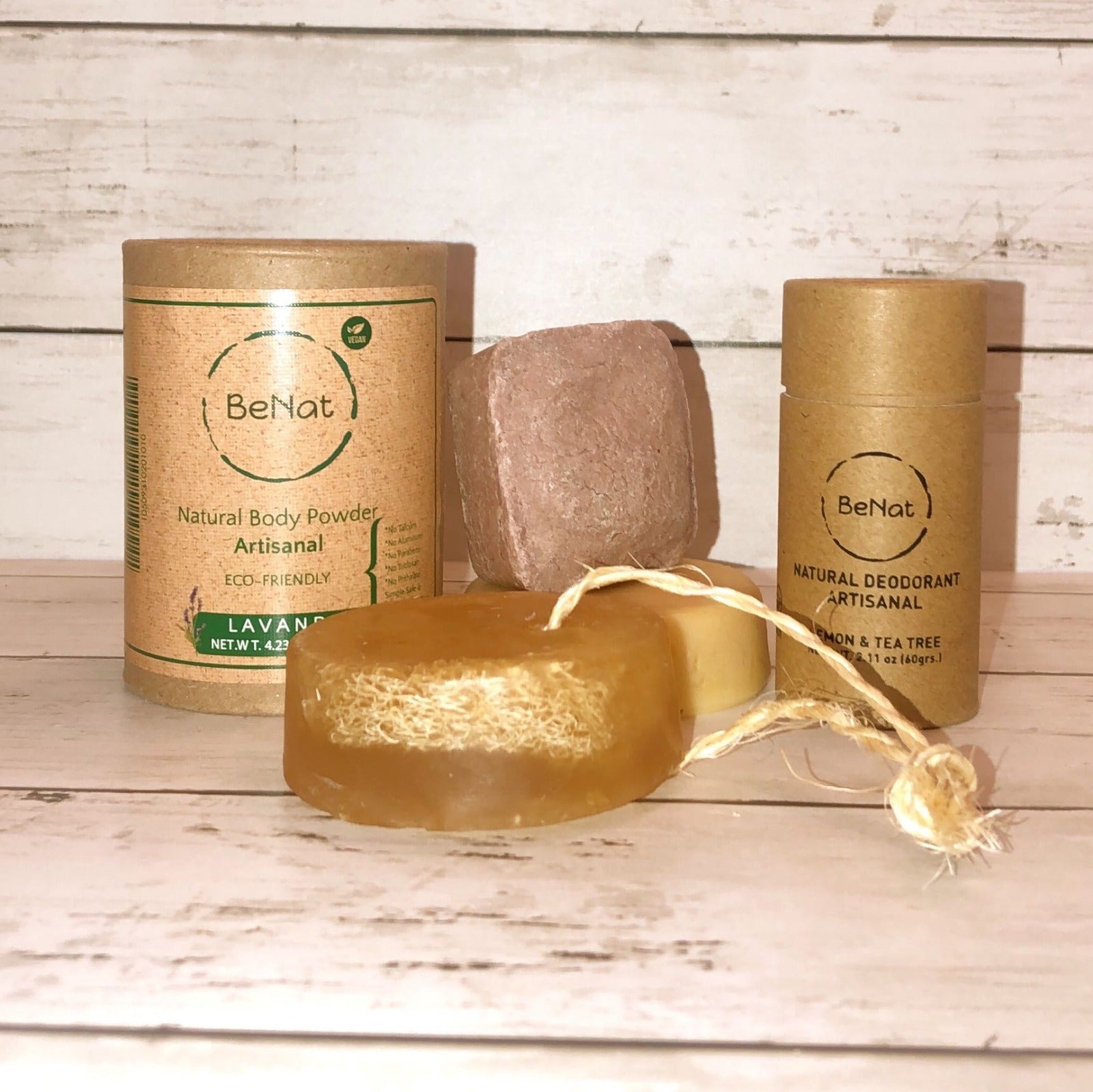 All-Natural Personal Care Bundle featuring five eco-friendly products including body powder, deodorant, shampoo bar, conditioner bar, and soap bar.